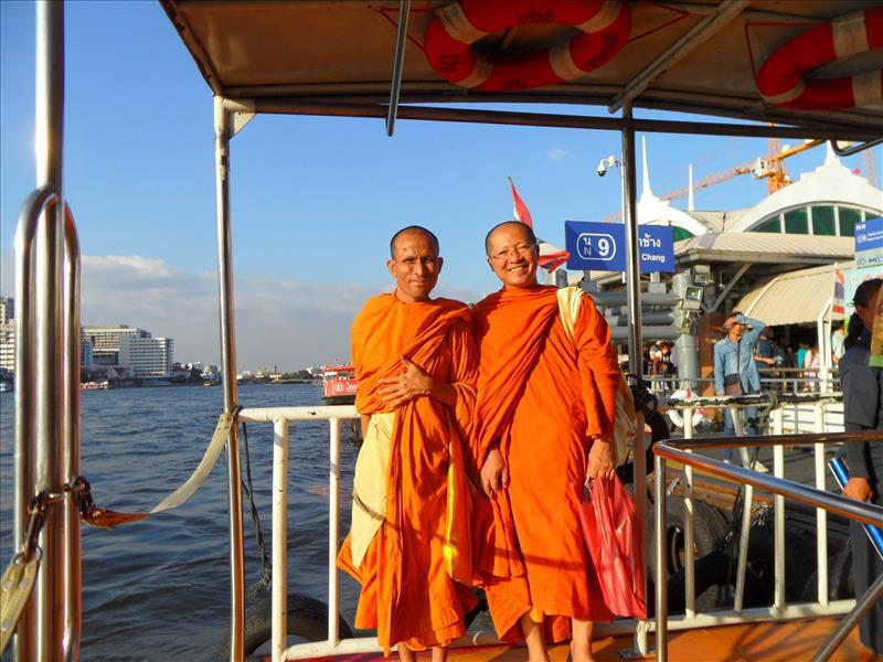 buddhist-monks-express-boat-chao-phraya-river-bangkok-thailand