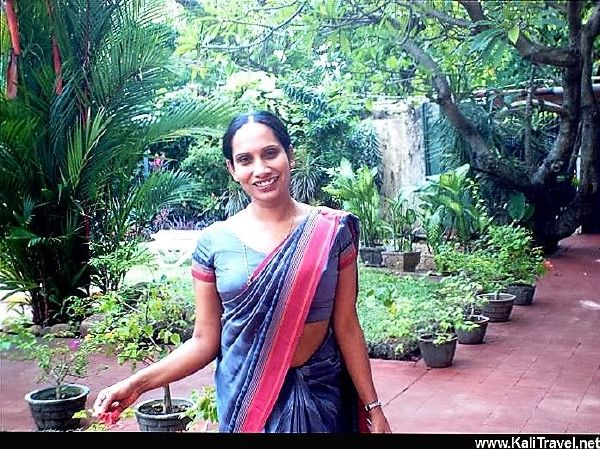 Sri Lankan waitress in the gardens of our Colombo hotel.