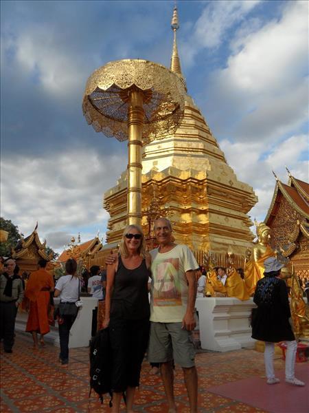 Kali and Juan standing by the Golden Stupa at Wat Doi Suthep Temple in Chiang Mai.