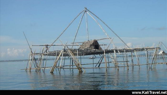Typical Lombok fishing platform made with sticks in the sea.