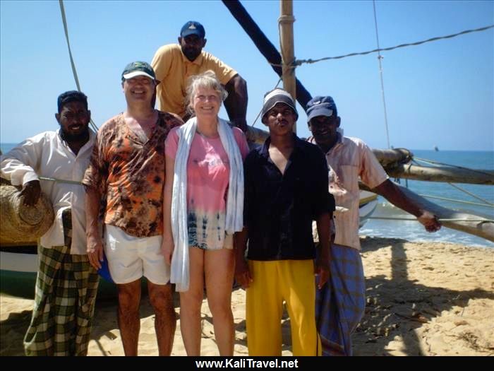 Me and my husband with Sri Lankan crew of a catamaran on Negombo beach.
