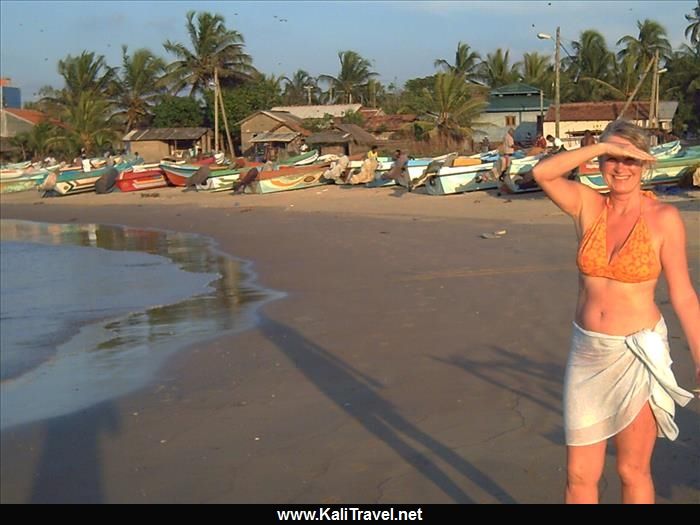 Me, in front of the little fishing boats on sandy Negombo beach.