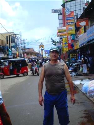 My husband on the main street of Negombo town.
