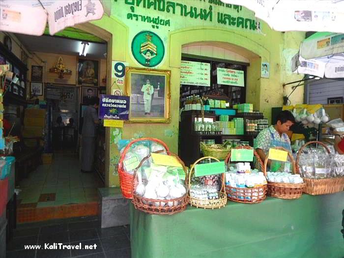 Natural herbs and potions on sale outside a traditional pharmacy in Bangkok.