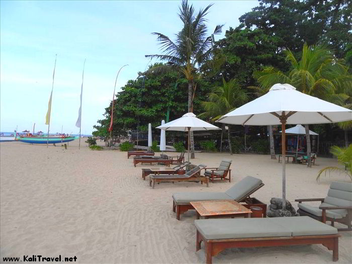 Sunbeds on sandy Sanur beach.