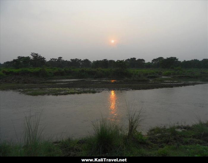 Sunset over Chitwan River, Nepal.