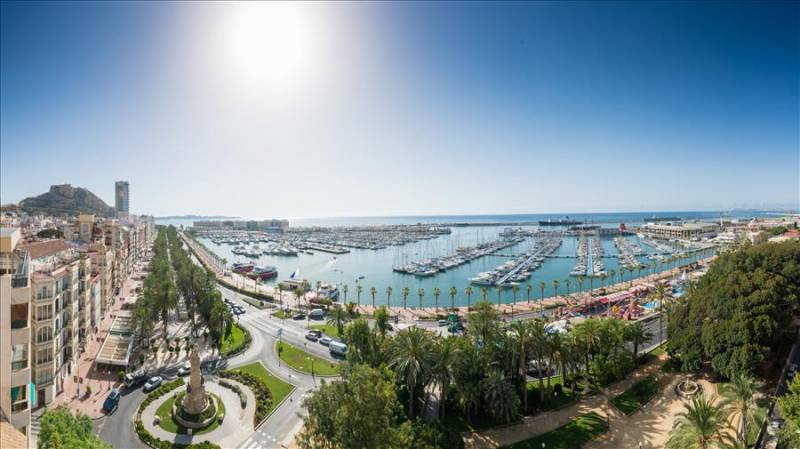 View of Alicante leisure harbour and seafront promenade in Costa Blanca.