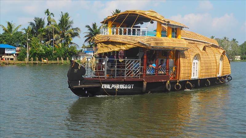 Houseboat on Vembanad Lagoon in Alleppey, Kerala backwaters.