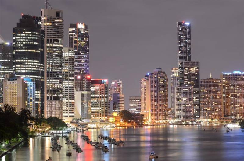 City lights reflecting in the waters at Brisbane South Bank in East Australia. 