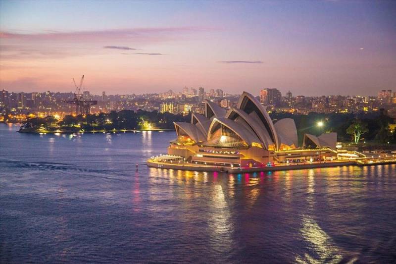 Sunset over Sydney Opera House on the East Coast Australia itinerary. 