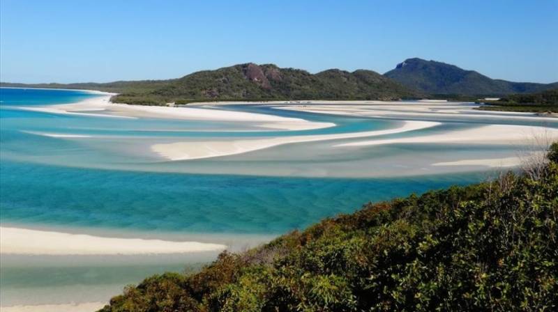 View of the sands and ocean of Whitehaven Bay on Australia's East Coast.