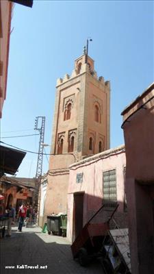 Islamic tower in the back streets of Marrakesh medina.