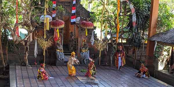 Traditional Barong Dancers by temple in Ubud.