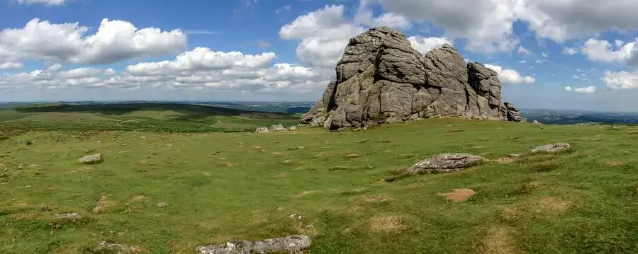 Giant rock of Haytor on the grassy moors.