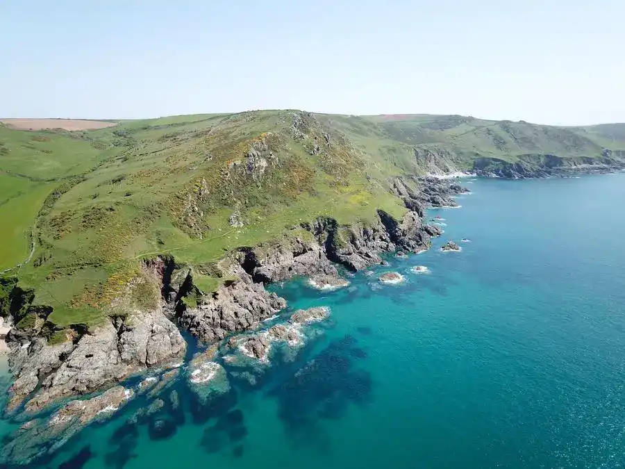A beautiful place to visit is Devon's south coast.