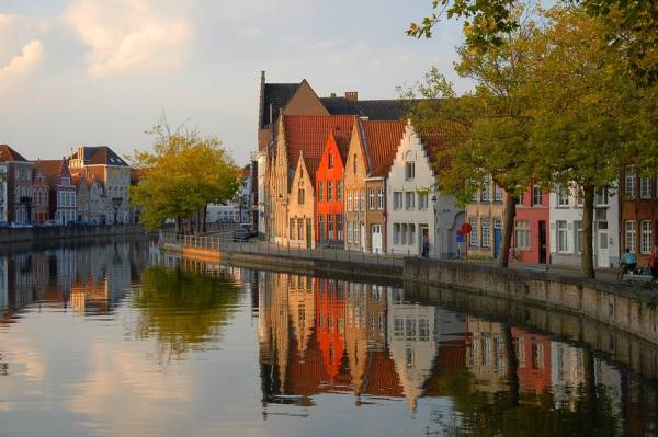 Colourful medieval canal houses in Bruges, Belgium.