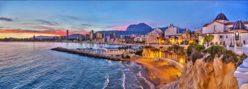 View over Benidorm old town and Poniente Beach at sunset, Costa Blanca.