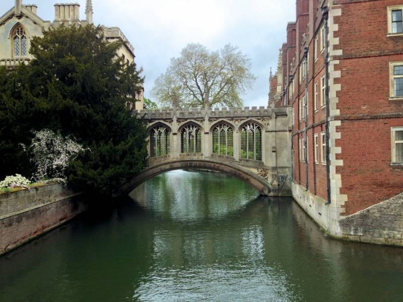 Ornate Bridge of Sighs spans River Cam to St. John's College in Cambridge.