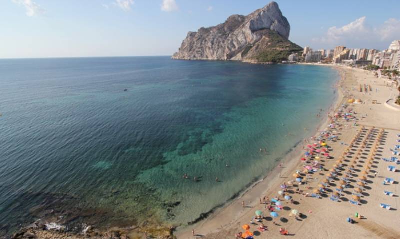 Sandy Levante Beach by the Mediterranean Sea in Calpe, Costa Blanca.