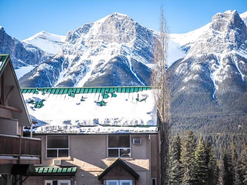 Mountain hotel in the snowy Canmore mountains near Banff, Alberta.