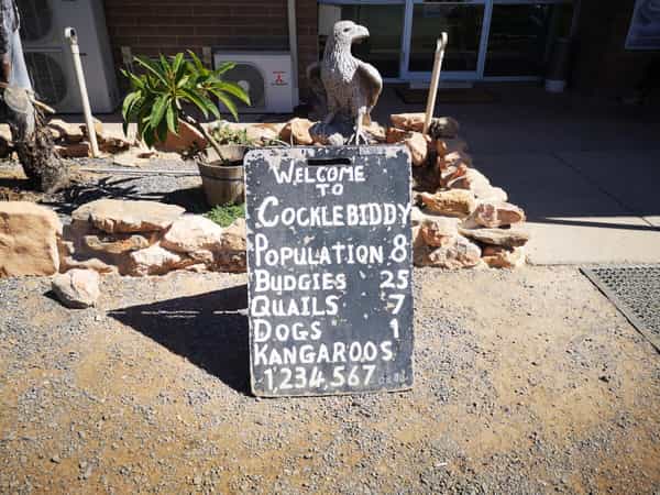 Blackboard with welcome to Cocklebiddy Roadhouse.