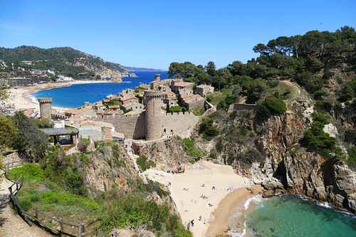 Tossa de Mar castle between 2 sandy coves on Costa Brava.