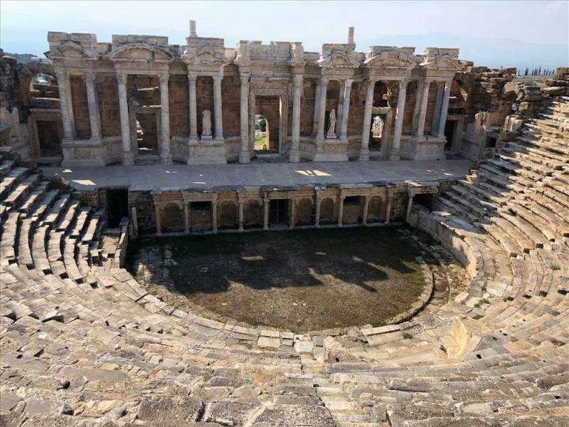 Semi circle of stone steps fronting the Theatre of Ephesus heritage site. 