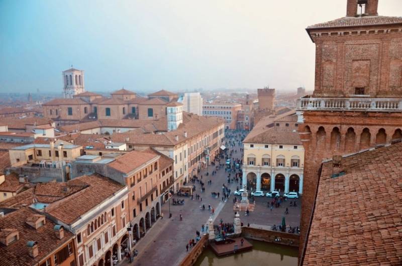 View over rooftops of Ferrara historical city in Italy.