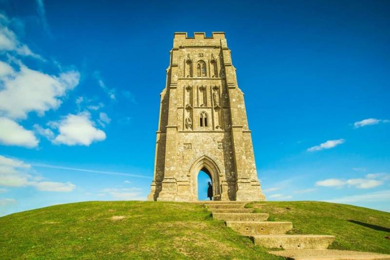 Steps up the grass slope to Glastonbury Tor in Somerset.