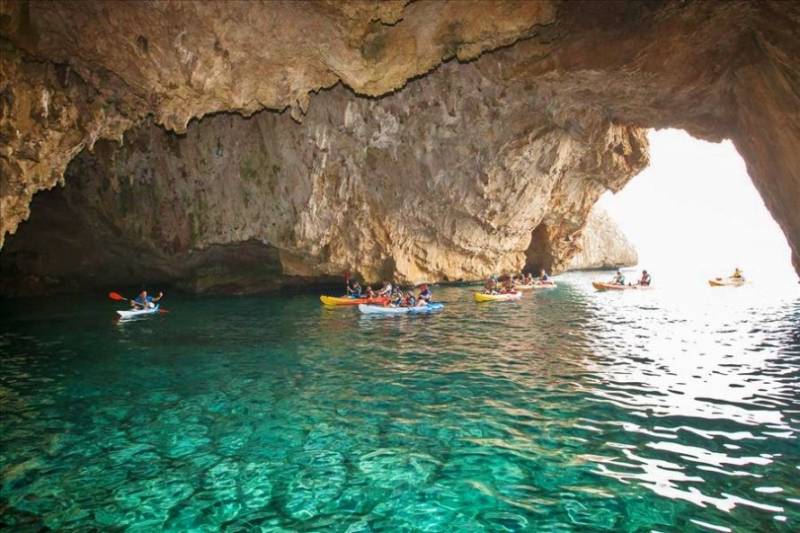 Kayak in Llop Mari Cave near Jávea, Costa Blanca.