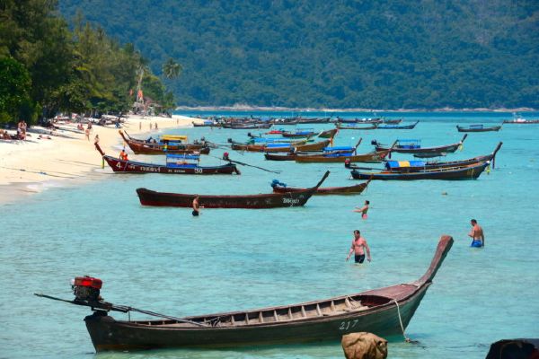 Long-tail boats in the sea off Koh Lipe Island in Thailand