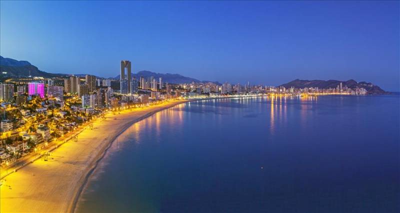 Benidorm La Cala Beach, sands and sea at twighlight.