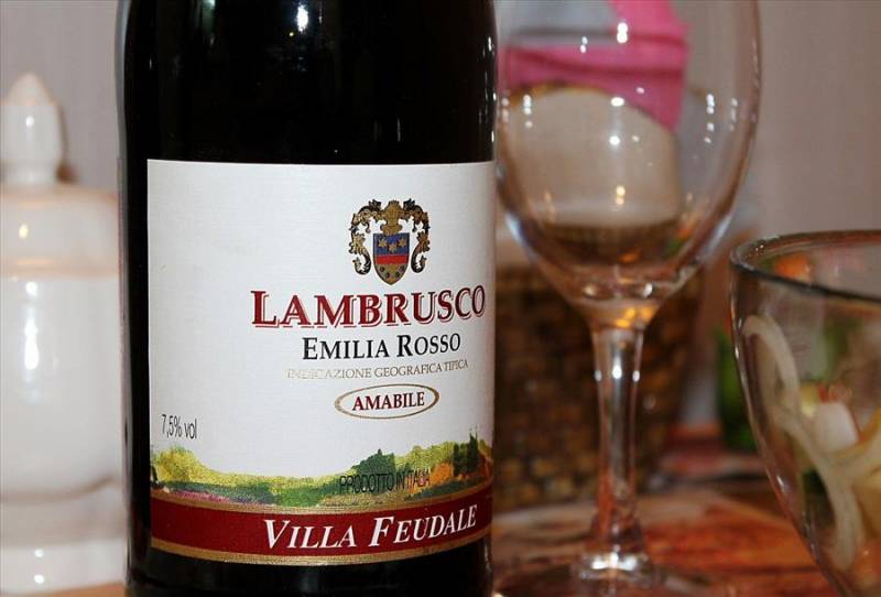Bottle of Lambrusco wine and wine glass.