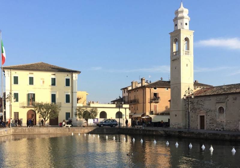 View of Lazise belltower in Lake Garda, Italy.