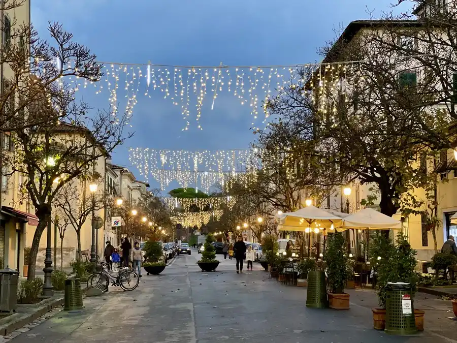 Overhead Christmas street lighting in historical Lucca.