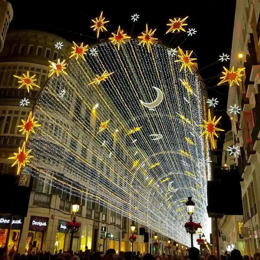 December Christmas lighting over Málaga shopping street.