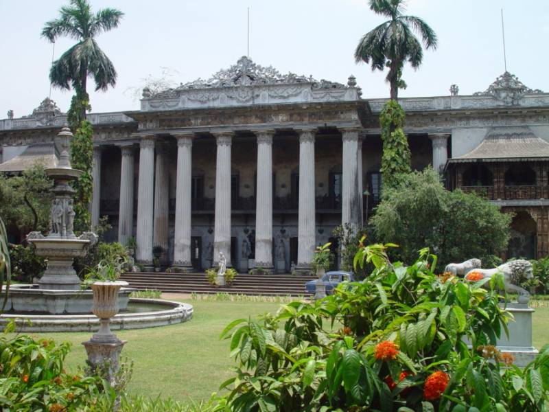 Colonnaded white Marble Palace and gardens in Kolkata, India.