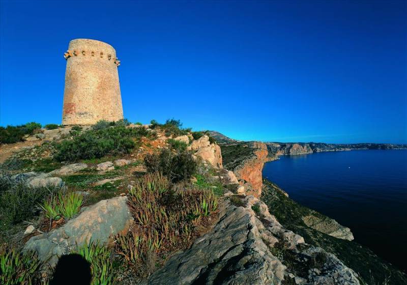 Cala D'Or watchtower on the cliffs of Moraira in Costa Blanca.