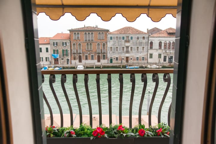 Balcony view over the canal from Murano Suites, Venice Lagoon.