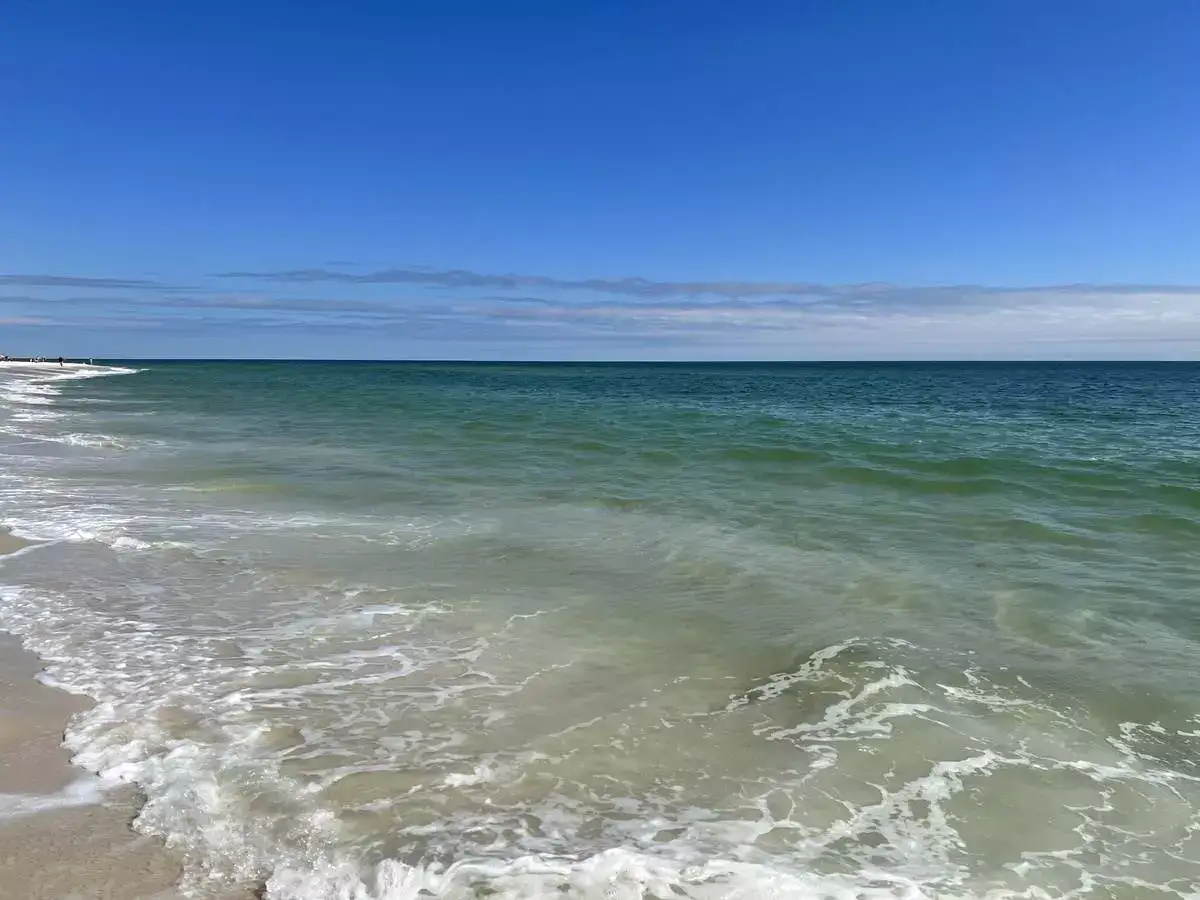 Gentle waves on the sands of Gulf Shores beach.