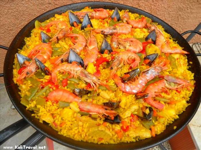 Saffron rice seafood paella typical Alicante cuisine.