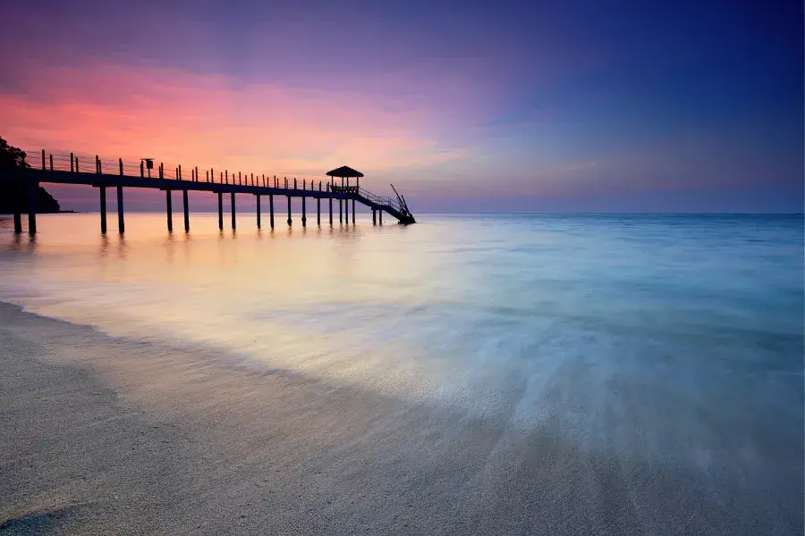 Sunset over the ocean and beach on Penang Island.