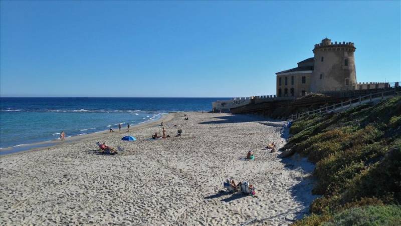 El Conde beach and watchtower in Pilar De La Horadada, Costa Blanca.