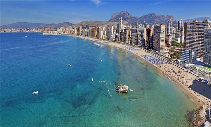 Benidorm Levante Beach and skyscrapers beside the Mediterranean Sea in Costa Blanca.