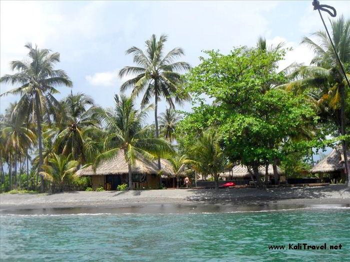 Sea, sands and palms in front of the cabins at Rinjani Eco Resort in Lombok.