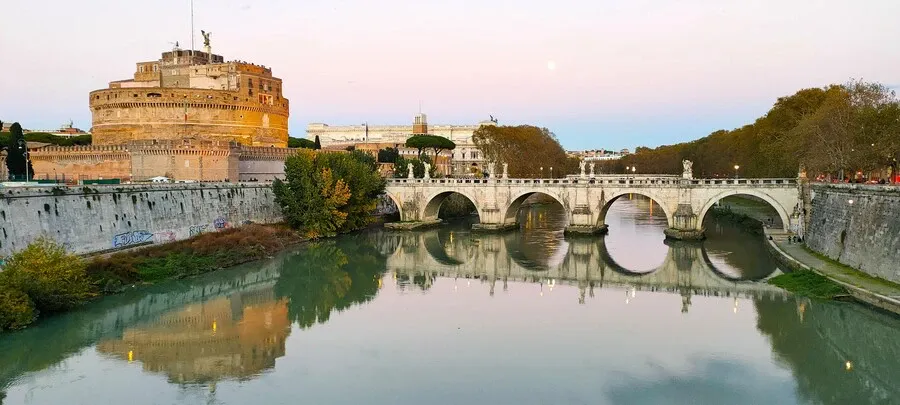Castel Sant'Angelo and the monumental bridge over the Tiber River in Rome.
