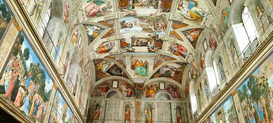 Frescoed ceiling and walls of the Sistine Chapel in the Vatican Museums.