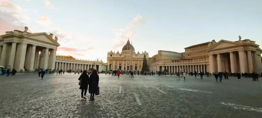 Huge St. Peter's square framing the Vatican cathedral.