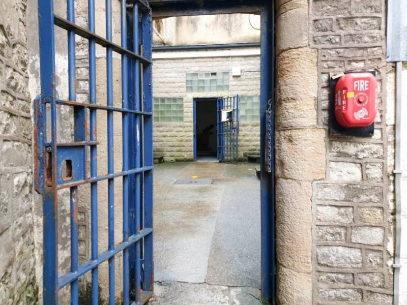 Blue gate leading into old Shepton Mallet Prison in Somerset.