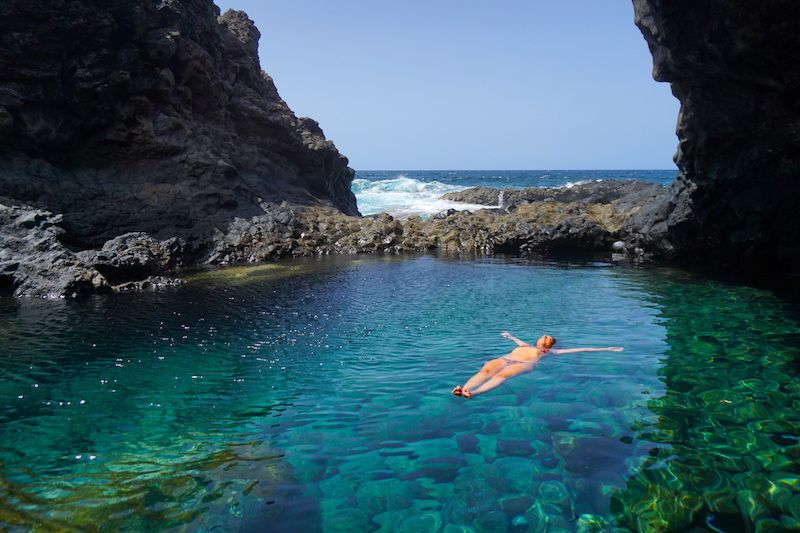 Charco Azul sea pool between volcanic rocks on El Hierro Island.